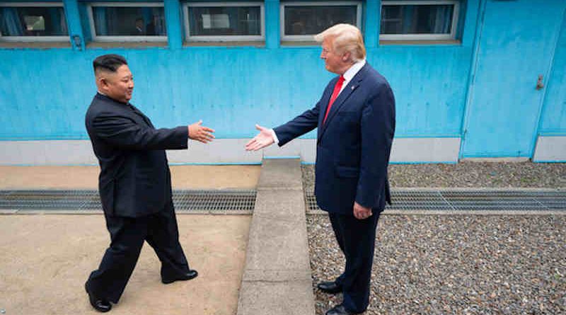 US President Donald Trump shakes hands with the Chairman of the Workers’ Party of Korea Kim Jong-un as the two leaders meet at the Korean Demilitarized Zone which separates North and South Korea on 30 June 2019. Photo: White House / Shealah Craighead