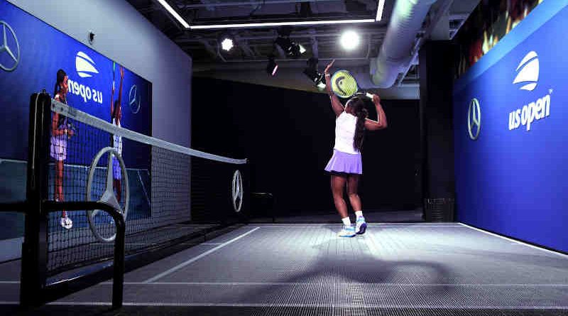 2017 US Open Champion and Mercedes-Benz Ambassador Sloane Stephens Tries the All-New Mercedes-Benz Augmented Reality Experience at the US Open Fan Zone featuring MBUX Technology.