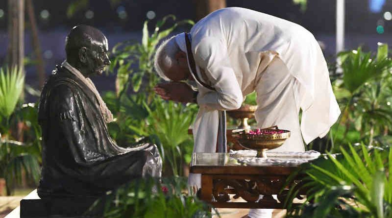 Narendra Modi paying homage to Mahatma Gandhi, at Sabarmati Ashram, in Ahmedabad, Gujarat on October 02, 2019. Photo: PIB
