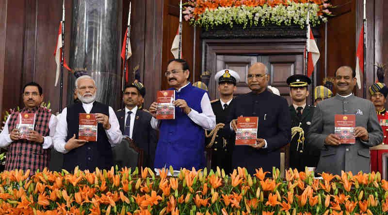 The President, Ram Nath Kovind, the Vice President, M. Venkaiah Naidu, the Speaker Lok Sabha, Om Birla, the Prime Minister, Narendra Modi and the Union Minister for Parliamentary Affairs Pralhad Joshi during the special session of Parliament to commemorate the 70th Constitution Day in New Delhi on November 26, 2019. Photo: PIB