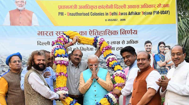 Narendra Modi being felicitated by the RWA Members for regularization of unauthorized colonies in Delhi, under the PM-UDAY (Unauthorised colonies in Delhi Awas Adhikar Yojna), in New Delhi on November 08, 2019. Photo: PIB