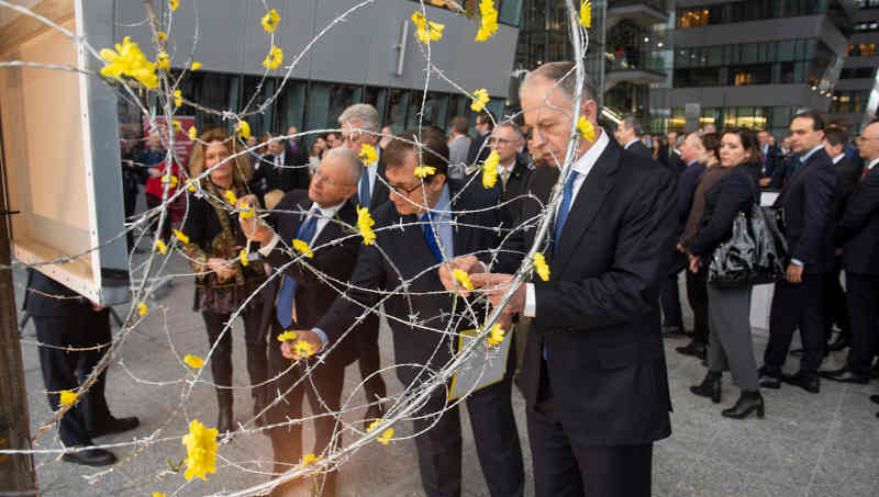 NATO Deputy Secretary General Mircea Geoană and Francesco Talò (Italian Permanent Representative to NATO) at the unveiling of art installation “Dandelions” at a ceremony hosted by the Italian delegation to NATO, marking the International Holocaust Remembrance Day. Photo: NATO