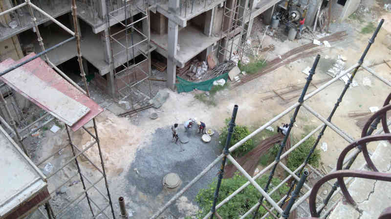 S-Gang members are carrying out construction activity with external construction workers and in connivance with construction companies to spread coronavirus at DPS CGHS, Sector 4, Dwarka, New Delhi. Photo: RMN News Service