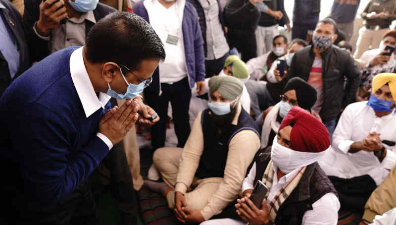 Delhi chief minister Arvind Kejriwal meeting protesting farmers in Delhi on December 7, 2020. Photo: Aam Aadmi Party