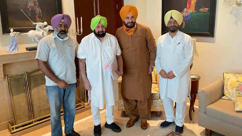 Punjab chief minister Amarinder Singh with Punjab Pradesh Congress Committee (PPCC) president Navjot Singh Sidhu. Photo: PPCC