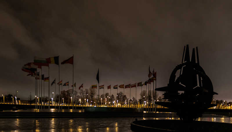 NATO Headquarters in Brussels, Belgium, joined other international landmarks and switched off lights on 21 December 2022 in solidarity with Ukraine. Photo: NATO