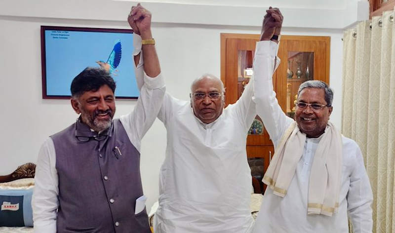 Congress leaders DK Shivakumar, Mallikarjun Kharge, and Siddaramaiah after winning the Karnataka election 2023. Photo: Congress
