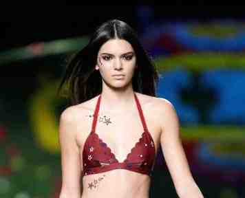 Kendall Jenner rocked Tattoo Junkee "Twin Stars" body art down the Tommy Hilfiger runway during New York Fashion Week.