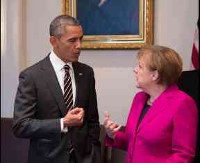 President Barack Obama and Chancellor Angela Merkel of Germany talk in the Roosevelt Room of the White House prior to a working lunch, Feb. 9, 2015. (Official White House Photo by Pete Souza)