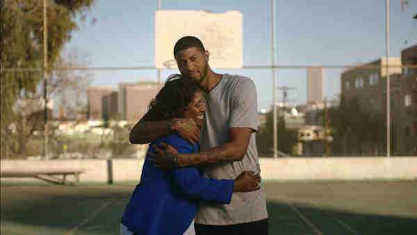 NBA All-Star Paul George with his mom, Paulette