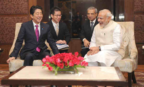 Shinzo Abe and Narendra Modi before the start of India-Japan Business Leaders Forum, in New Delhi on December 12, 2015