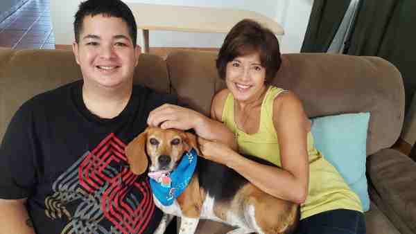 Terminally ill, aid-in-dying advocate Miguel Carrasquillo & mom Nilsa Centeno with her dog