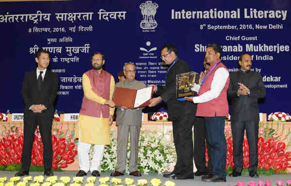 The President Pranab Mukherjee gave away the Saakshar Bharat awards, at the International Literacy Day celebrations, in New Delhi on September 08, 2016. The Union Minister for Human Resource Development Prakash Javadekar is also seen.