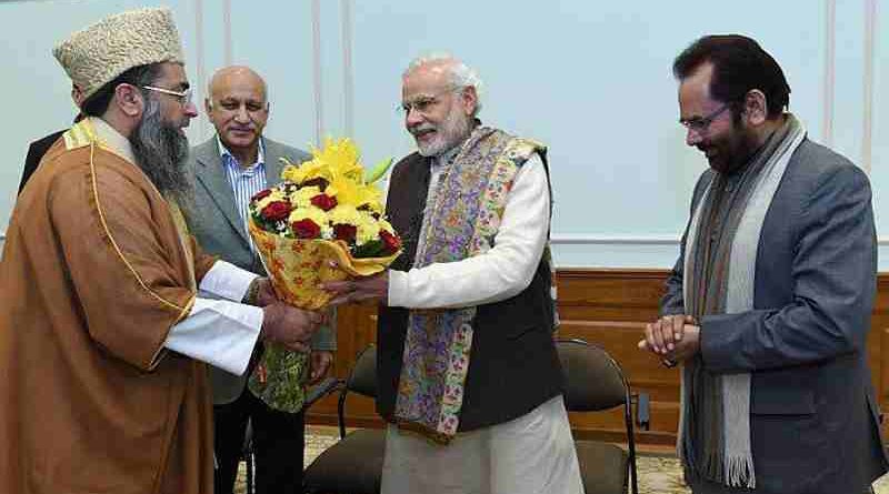 Union Minister of State for External Affairs M.J. Akbar standing with PM Modi (file photo). Photo courtesy: Narendra Modi website