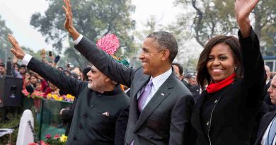 President Barack Obama and First Lady Michelle Obama wave to the crowd at the Rajpath saluting base following the Republic Day Parade in New Delhi, India, Jan. 26, 2015. (Official White House Photo by Pete Souza)