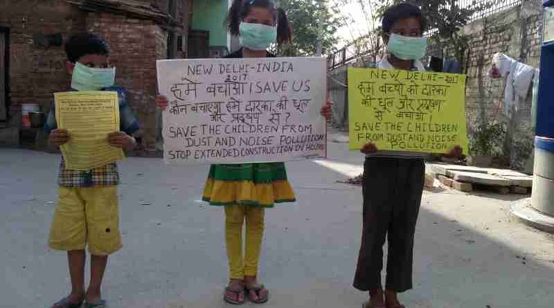 Children demonstrating in the streets of New Delhi so that the Indian government should protect them from dust and noise pollution coming from extended construction activity. Click the photo for details. Photo by Rakesh Raman