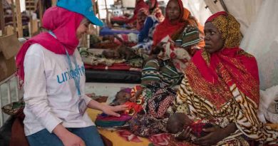 (left) Syrian refugee and education activist Muzoon Almellehan speaks with Salmata, 21, from Tala village as she sits on a bed alongside her three-week-old malnourished triplets at the nutrition ward in Bol Regional Hospital, Lake Region, Chad, Tuesday 18 April 2017.