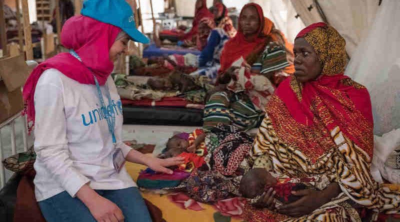 (left) Syrian refugee and education activist Muzoon Almellehan speaks with Salmata, 21, from Tala village as she sits on a bed alongside her three-week-old malnourished triplets at the nutrition ward in Bol Regional Hospital, Lake Region, Chad, Tuesday 18 April 2017.