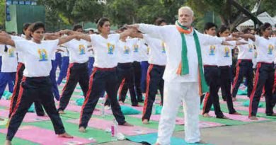 Narendra Modi Playing Yoga Tricks. Photo: Press Information Bureau