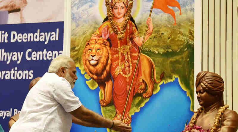 Narendra Modi paying floral tributes to Swami Vivekananda on celebrations of 125th anniversary of Swami Vivekananda Chicago address, in New Delhi on September 11, 2017