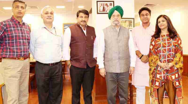 Delhi BJP President Manoj Tiwari along with a delegation of party leaders meeting the Union Urban Development Minister Hardeep Singh Puri