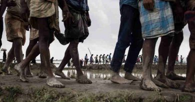 In September 2017, newly arrived Rohingya refugees from Myanmar walk through paddy fields and flooded land after they fled over the border into Cox’s Bazar district, Chittagong Division in Bangladesh. Photo: UNICEF/Brown