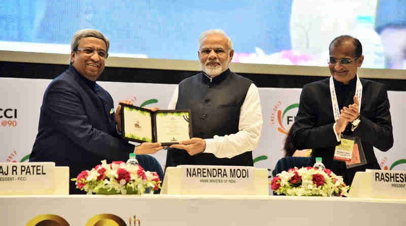 Narendra Modi being felicitated at the inaugural session of 90th Annual General Meeting of FICCI, in New Delhi on December 13, 2017