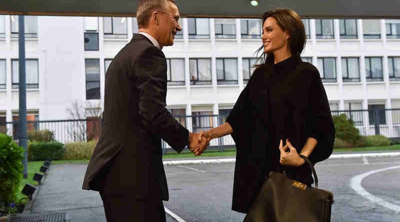 Left to right: NATO Secretary General Jens Stoltenberg greeting Angelina Jolie (UN High Commissioner for Refugees Special Envoy) upon her arrival to NATO Headquarters. Photo: NATO