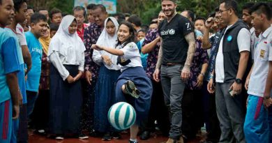 UNICEF Goodwill Ambassador David Beckham plays football with students and teachers at the SMPN 17 school in Semarang, Indonesia, March 27, 2018
