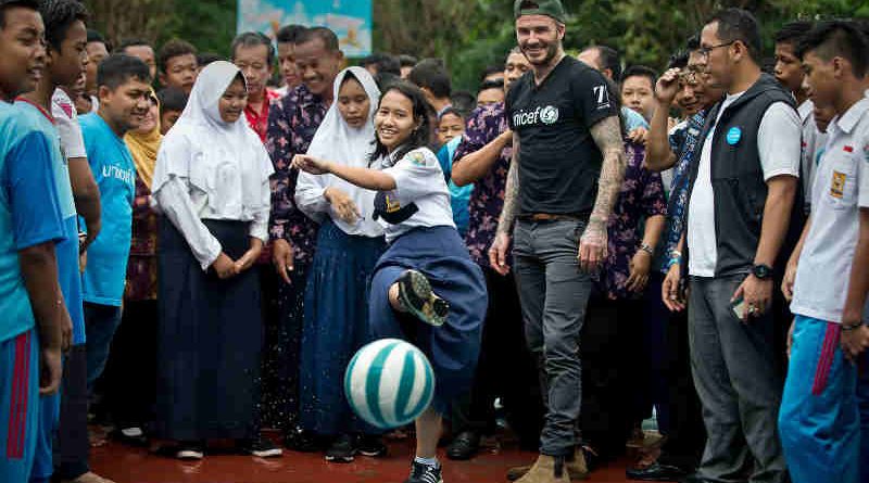 UNICEF Goodwill Ambassador David Beckham plays football with students and teachers at the SMPN 17 school in Semarang, Indonesia, March 27, 2018