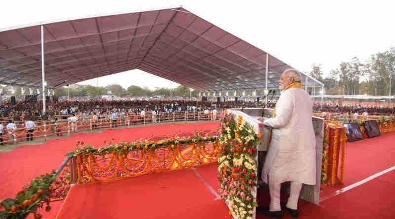 Narendra Modi addressing a public meeting, in Varanasi, Uttar Pradesh on March 12, 2018 (file photo). Courtesy: PIB