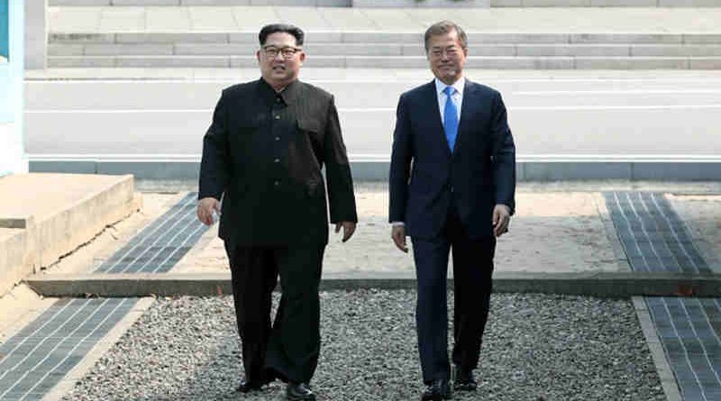 President Moon Jae-in (right) of the Republic of Korea greets Chairman of the State Affairs Commission Kim Jong-Un of the Democratic People's Republic of Korea in Panmunjeom. Photo: UN