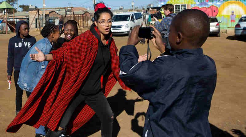 On 22 July 2018 in South Africa, (centre) UNICEF Goodwill Ambassador Lilly Singh interacts with a child during a visit to the Isibindi Safe Park in Soweto. Photo: UNICEF