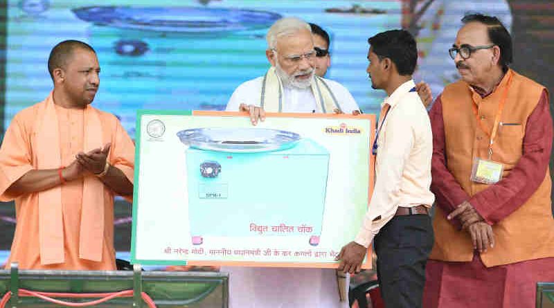 Narendra Modi at the inauguration of the various development projects, in Varanasi, Uttar Pradesh on September 18, 2018. The Chief Minister of Uttar Pradesh, Yogi Adityanath is also seen.