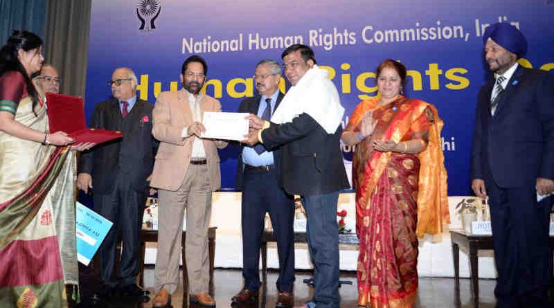 The Union Minister for Minority Affairs, Shri Mukhtar Abbas Naqvi presenting the biennial Mahatma Gandhi awards for writing in the field of promoting human rights and spreading awareness on human rights, at the Human Rights Day function, organised by the National Human Rights Commission, in New Delhi on December 10, 2018. The Chairperson of National Human Rights Commission, Shri Justice H.L. Dattu and other dignitaries are also seen.