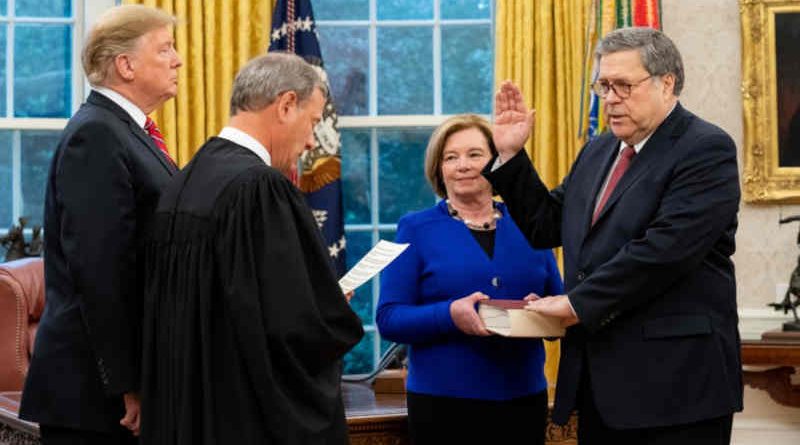 President Donald J. Trump participates in swearing-in of William P. Barr administered by U.S. Supreme Court Chief Justice John Roberts on February 14, 2019. Attorney General Barr's wife, Christine, holds the Bible. Official White House Photo by Tia Dufour