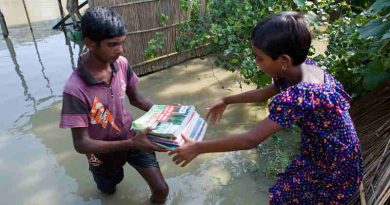 Momtaz (9) and Akobbar Hossain (15) are both residing in the village of Rajibpur, Chilmari, Kurigram which is one of the highly flood affected areas in Bangladesh. Their books got wet when water rushed into their home. Photo of 17th of July 2019. Photo: Kiron / UNICEF