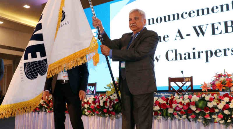 Sunil Arora with the A-WEB flag which was handed over by the outgoing Chairman of A-WEB from Romania, Ion Mincu Radulescu, at the inauguration of the 4th General Assembly meeting of A-WEB, in Bengaluru on September 3, 2019. Photo: PIB (file photo)