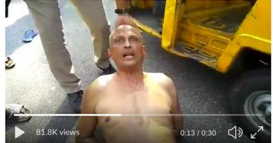 Dr Sudhakar Rao dragged on the road. Photo: Screengrab from Twitter video.
