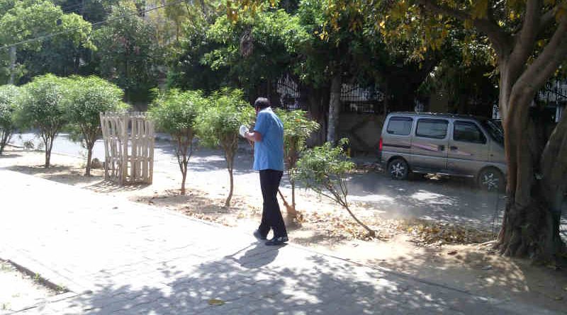 A worker cleans a road during coronavirus lockdown in New Delhi which is among the worst-affected cities of India. Photo: Rakesh Raman / RMN News Service