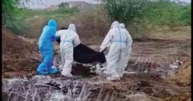 Dead bodies wrapped in a plastic cover were tossed into a pit for burial. Screengrab