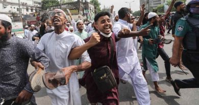 Protest against PM Modi’s visit outside Dhaka’s Baitul Mokarram mosque in March 2021. Demonstrators raised their shoes in their hands to register their anger against Modi. Photo: Mahmud Hossain Opu / Al Jazeera