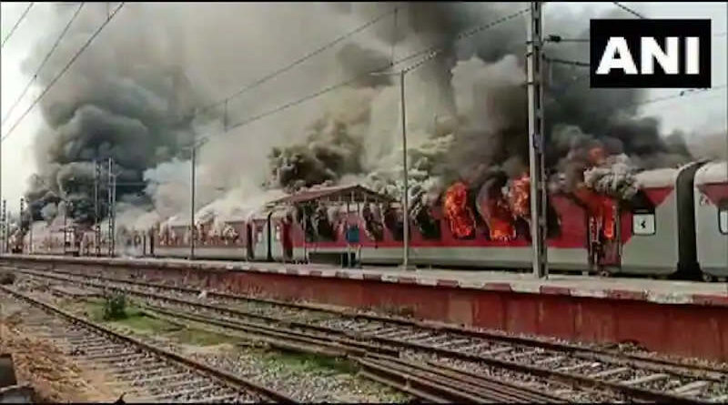 Agnipath recruitment scheme in India: Protesters set a train ablaze at Luckeesarai Junction. Photo: ANI / Mint