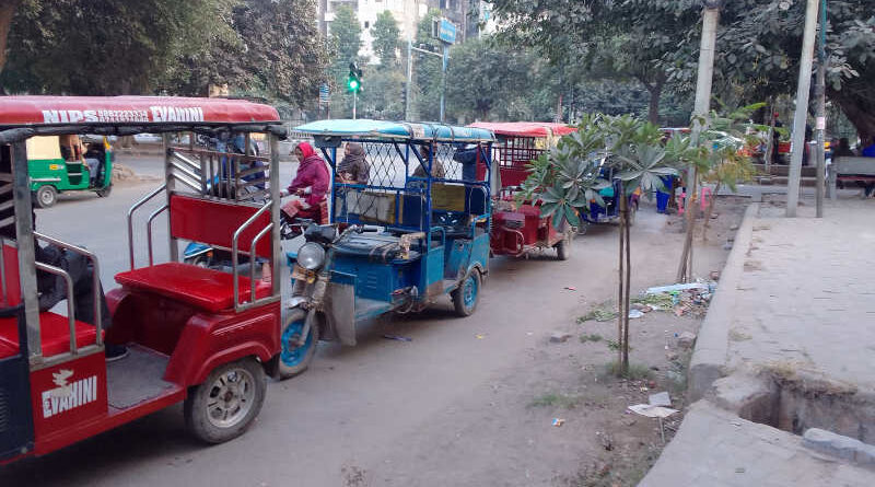 Battery-operated electric rickshaws provide employment to many people in New Delhi. Photo: Rakesh Raman / RMN News Service