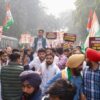 Congress workers protest against PM Modi and Gautam Adani's alleged corruption.