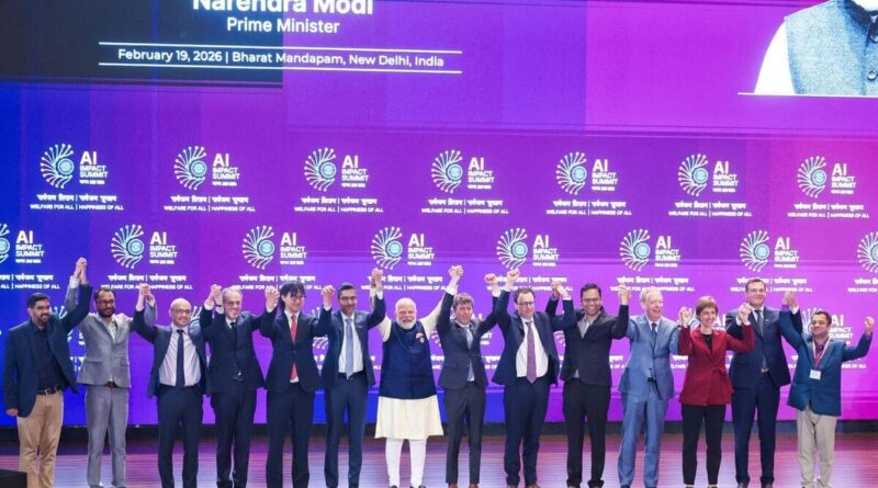Narendra Modi with tech leaders at the India AI Impact Summit 2026. Photo: India AI Impact Summit